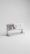 A modern display stand for trading cards, featuring polished metal and acrylic materials, with a subtle shadow to ground...