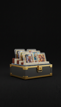 Collector’s Vault branded storage case, Default: three-quarter angle slightly above eye-level to reveal card faces and...